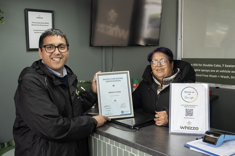 Grace-du-Preez-from-Whizzo-Car-Wash-proudly-shows-the-business-s-Water-Star-.jpg